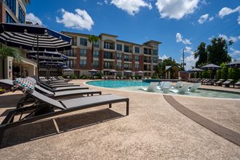 Pool area with sun loungers
